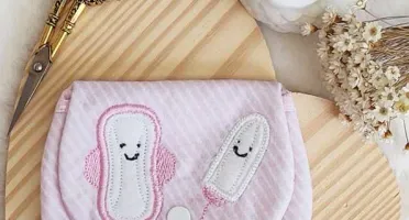 Porta-absorventes de feltro