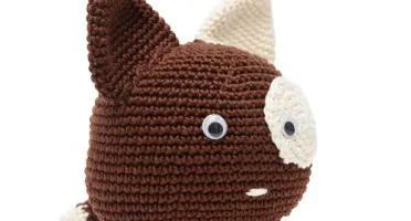 Cachorro peso de porta em amigurumi