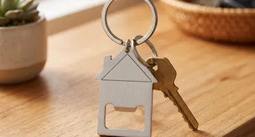 Chaveiro Abridor de Metal em Formato de Casa