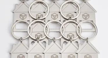 Chaveiro Abridor de Metal em Formato de Casa
