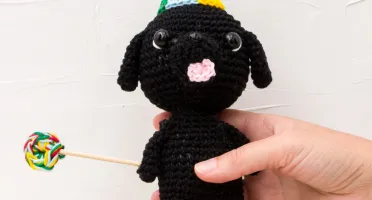 Cachorro Preto Numquiditu em Amigurumi