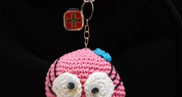 Chaveiro Carinha Feliz Rosa em Amigurumi