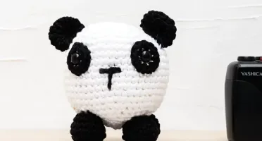 Urso Panda bola em amigurumi