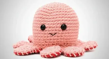 Polvo do Humor Rosa Reversível Feliz Bravo em Amigurumi