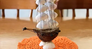 Toalhinha cor de laranja em crochê