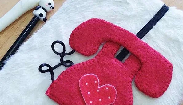 Marca-páginas telefone vermelho