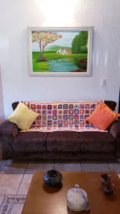 Manta em Crochê Multicolorida - Artesanato e Personalizados
