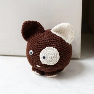 Cachorro peso de porta em amigurumi - Artesanato e Personalizados