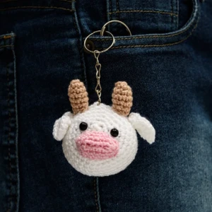 Chaveiro vaquinha em amigurumi - Artesanato e Personalizados