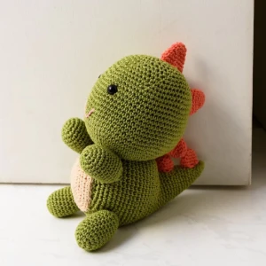 Dinossauro Peso de Porta em Amigurumi - Artesanato e Personalizados