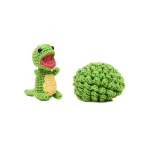 Ovo com filhote de dinossauro verde em amigurumi - Artesanato e Personalizados