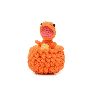 Ovo com filhote de dinossauro laranja em amigurumi - Artesanato e Personalizados