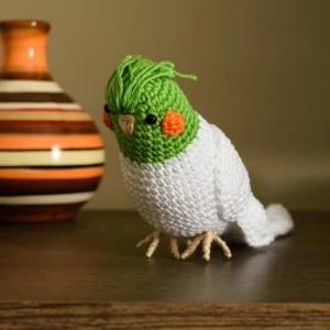 Calopsita verde em amigurumi - Artesanato e Personalizados