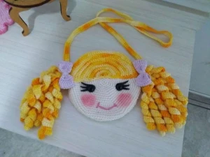Bolsa infantil em croche Boneca - Artesanato e Personalizados